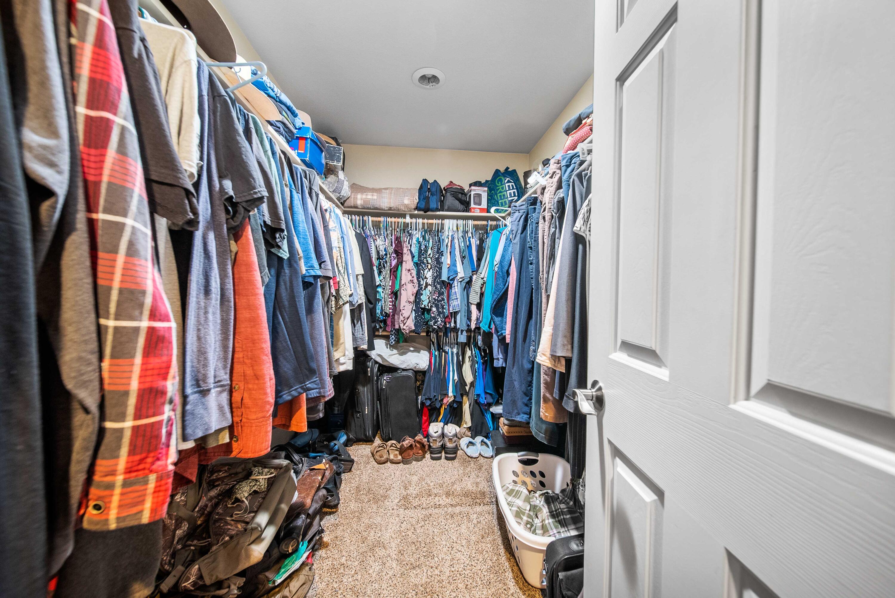 1280 Crow Road Merlin, OR 97532 - Photo 18 of 44 a view of walk in closet with clothes