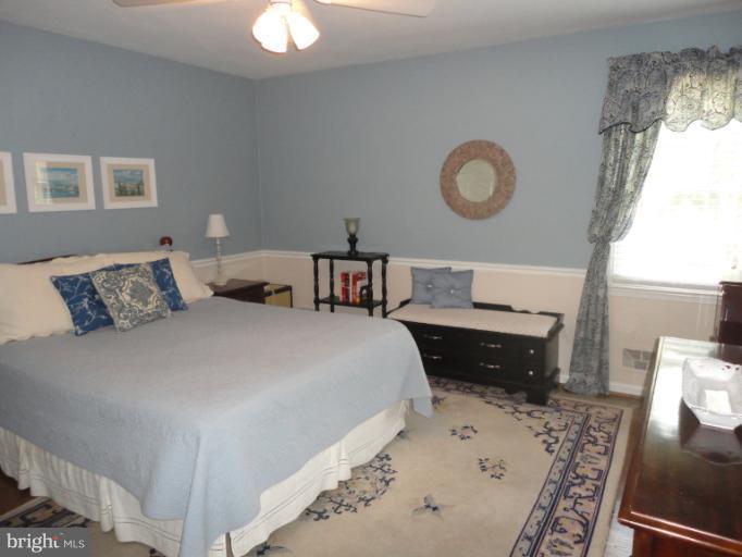 MASTER BEDROOM W/HARDWOOD FLOORS