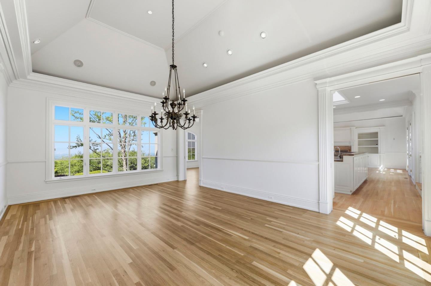 14113 Pike Road Saratoga, CA 95070 - Photo 17 of 78 a view interior of a house wooden floor a ceiling fan and windows