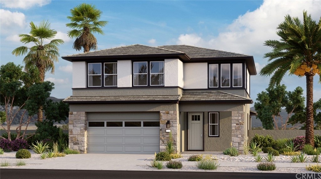 41114 Harvey Mudd Drive Palm Desert, CA 92211 - Photo 1 of 10 a front view of a house with a garden