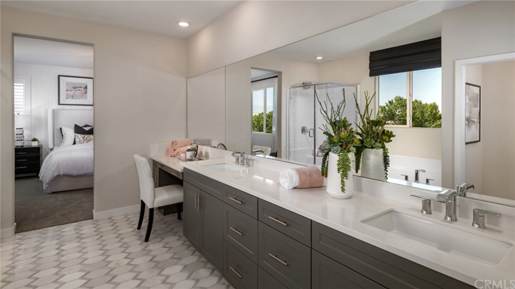 41114 Harvey Mudd Drive Palm Desert, CA 92211 - Photo 5 of 10 a bathroom with a sink double vanity and a mirror