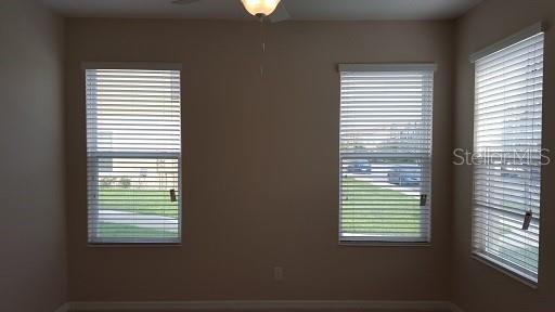7652 Ripplepointe Way Windermere, FL 34786 - Photo 15 of 21 a view of a room that has a window in it
