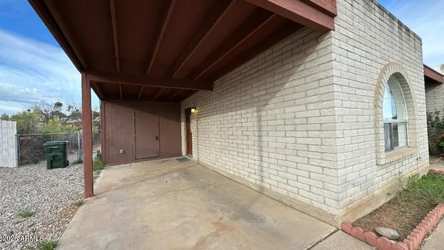 a view of backyard with cabin