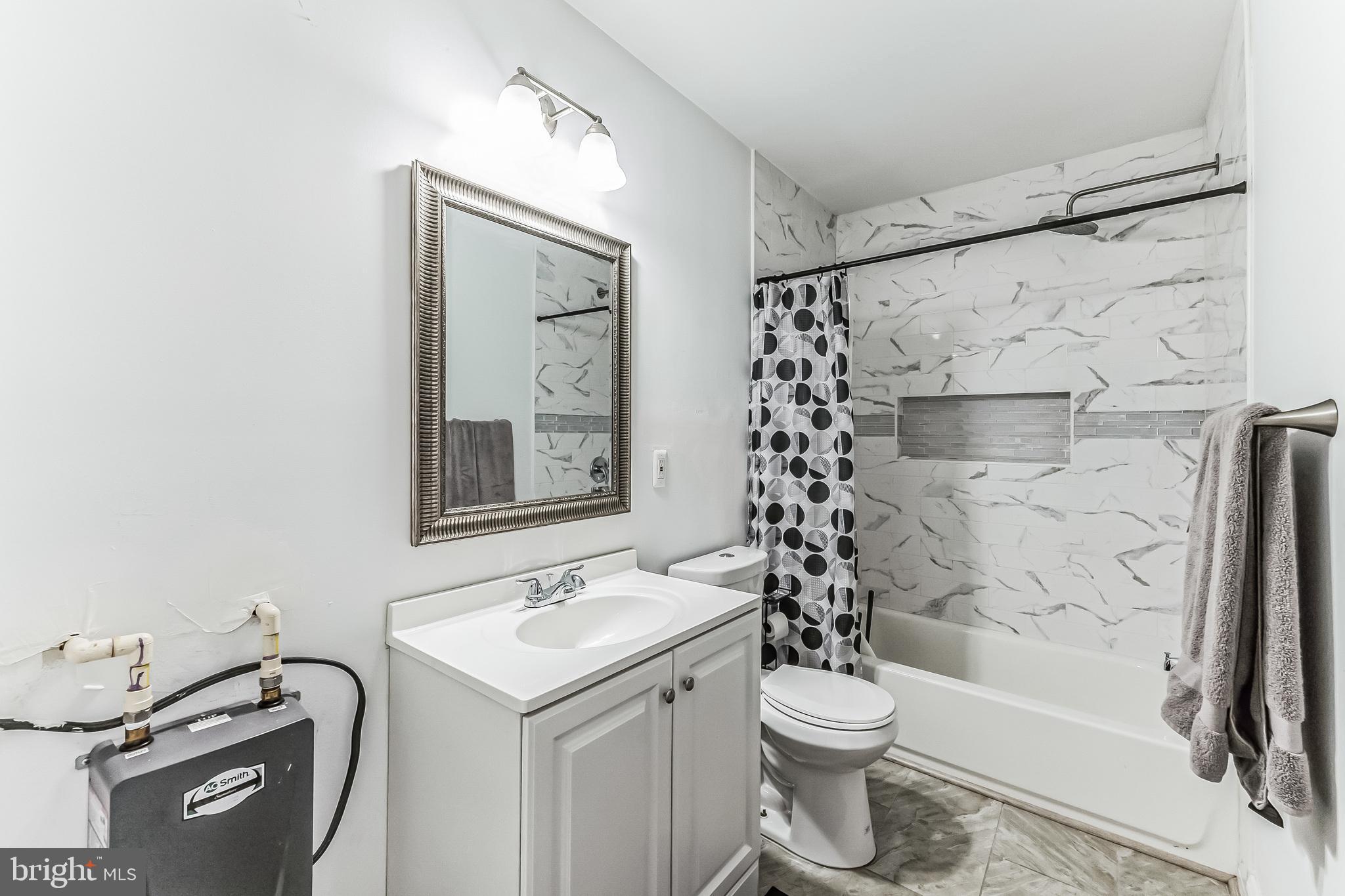 14710 Featherstone Road Woodbridge, VA 22191 - Photo 19 of 33 Pool house bathroom
