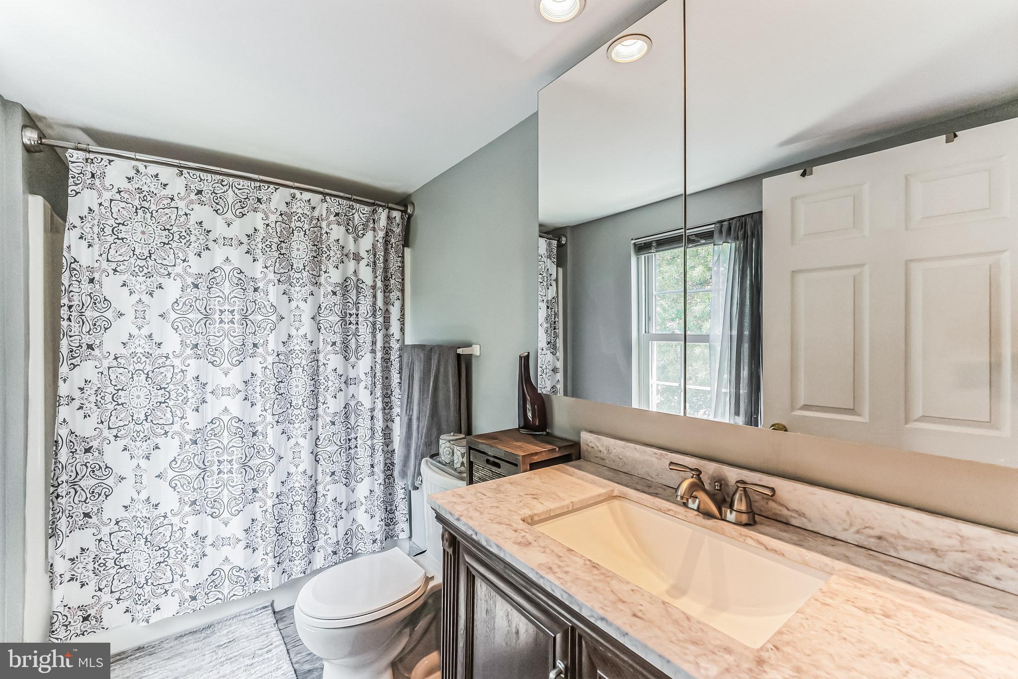 14710 Featherstone Road Woodbridge, VA 22191 - Photo 7 of 33 Primary bathroom