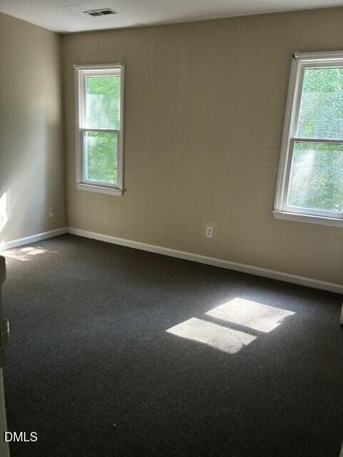 3104 Crandon Lane Raleigh, NC 27604 - Photo 7 of 10 an empty room with a window