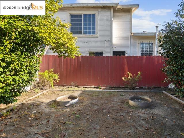 1556 78th Avenue Oakland, CA 94621 - Photo 11 of 11 a front view of a house with a yard