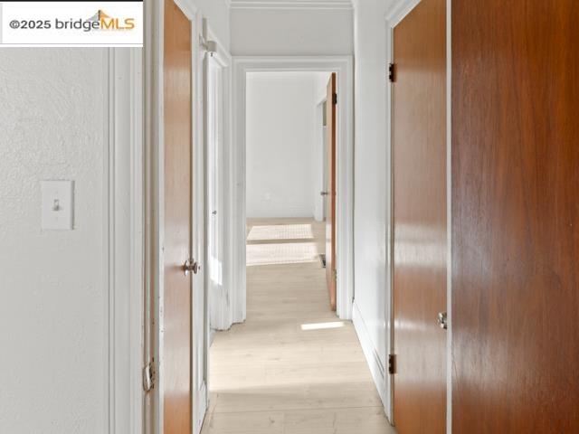 1556 78th Avenue Oakland, CA 94621 - Photo 8 of 11 a view of a bathroom from a hallway