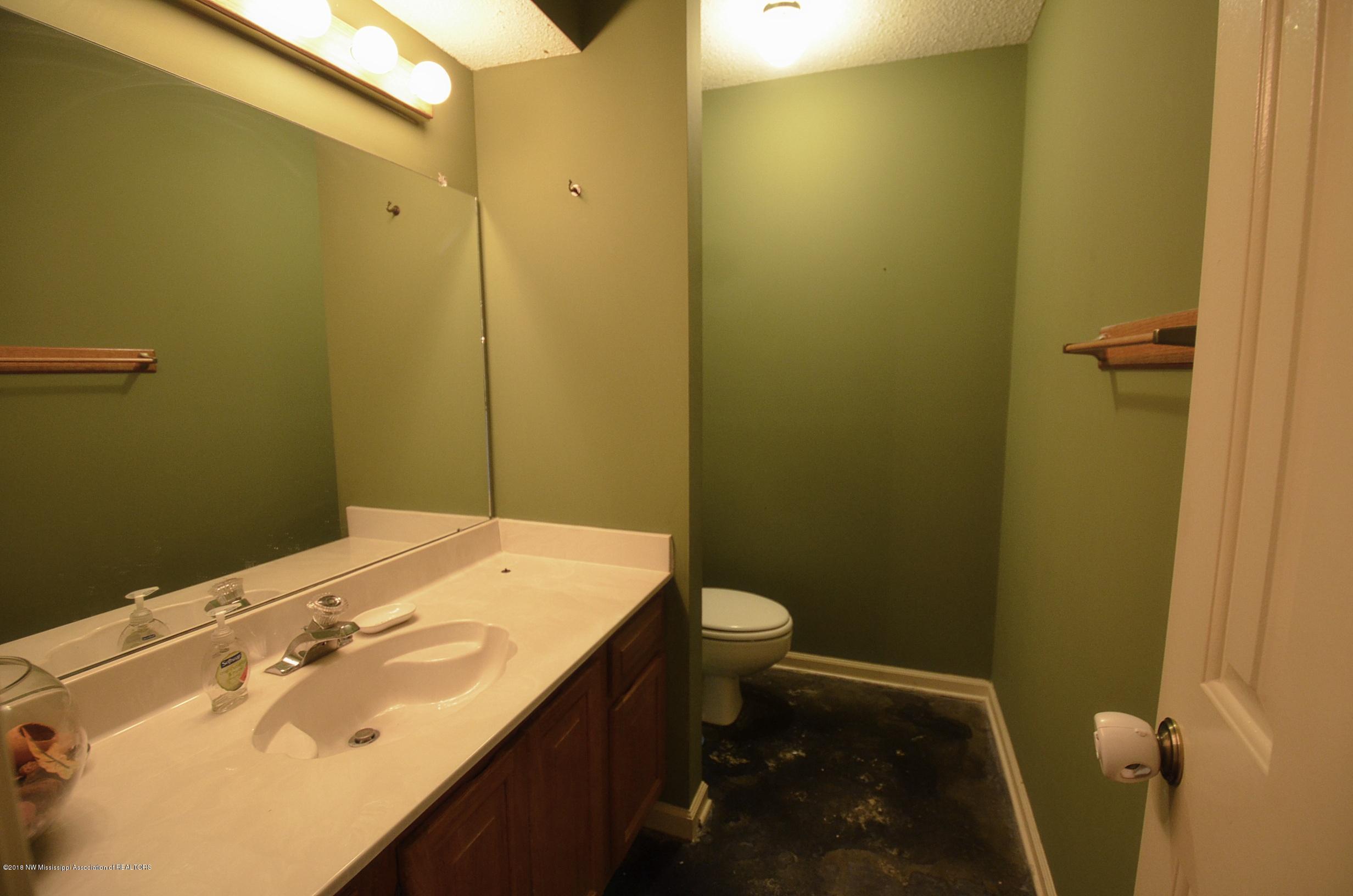3265 Getwell Road South Hernando, MS 38632 - Photo 24 of 33 Half bath in hallway