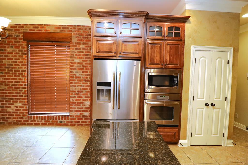 765 Dumaine Drive Bossier City, LA 71111 - Photo 12 of 20 a view of a refrigerator in the kitchen