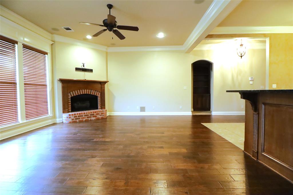 765 Dumaine Drive Bossier City, LA 71111 - Photo 6 of 20 a view of empty room with wooden floor and fan