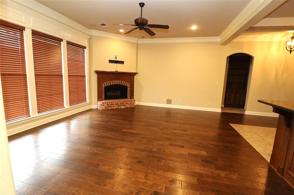 765 Dumaine Drive Bossier City, LA 71111 - Photo 7 of 20 a view of a livingroom with a fireplace and window