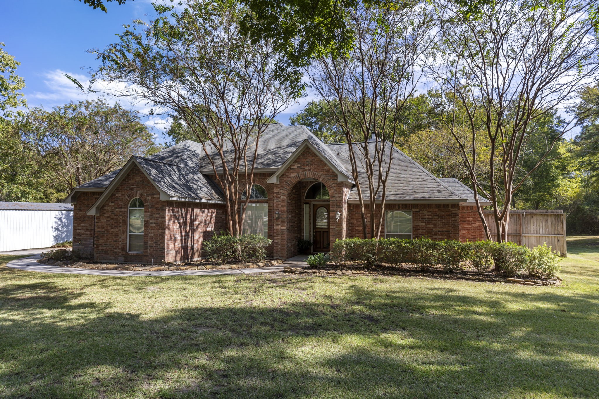 20111 Hilltop Ranch Drive Montgomery, TX 77316 - Photo 2 of 32 a front view of house with yard and trees around