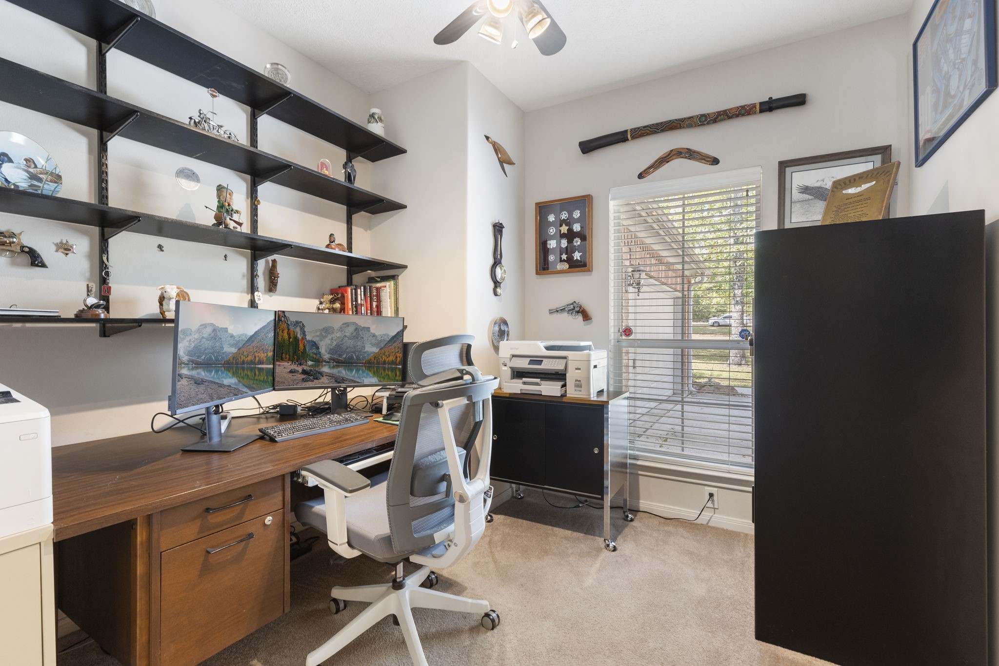 20111 Hilltop Ranch Drive Montgomery, TX 77316 - Photo 24 of 32 a view of a workspace with furniture and a window