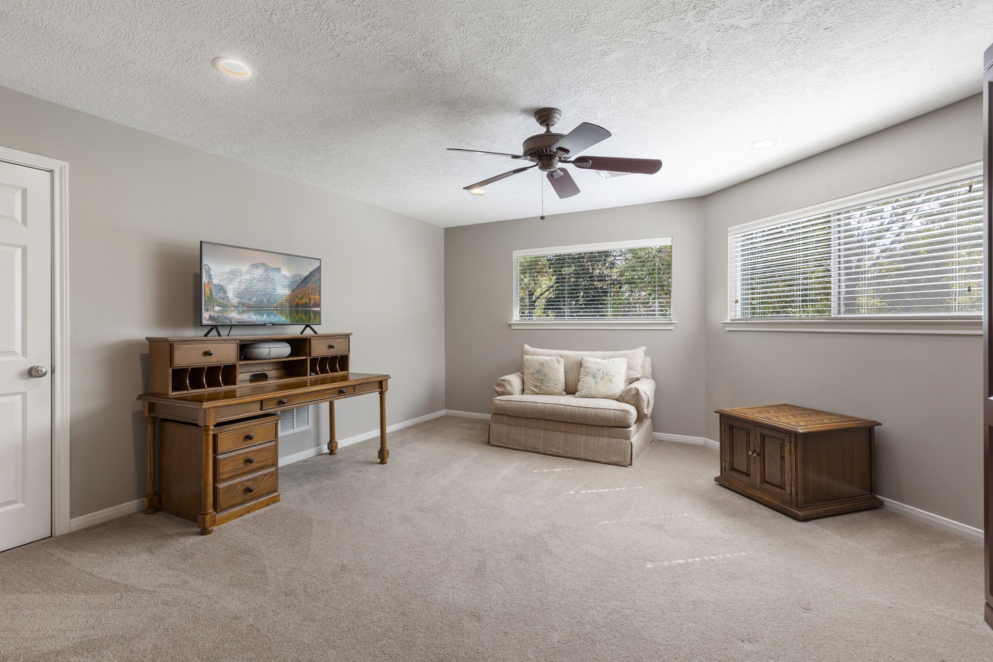 20111 Hilltop Ranch Drive Montgomery, TX 77316 - Photo 27 of 32 a living room with furniture and a window