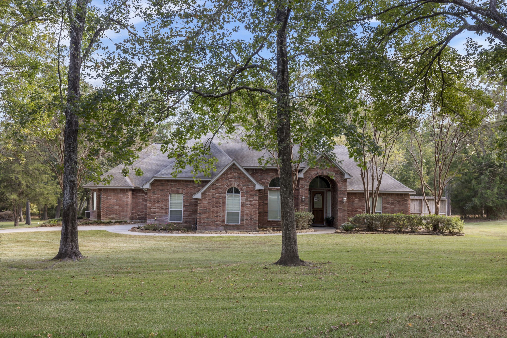 20111 Hilltop Ranch Drive Montgomery, TX 77316 - Photo 29 of 32 a front view of a house with yard and tree