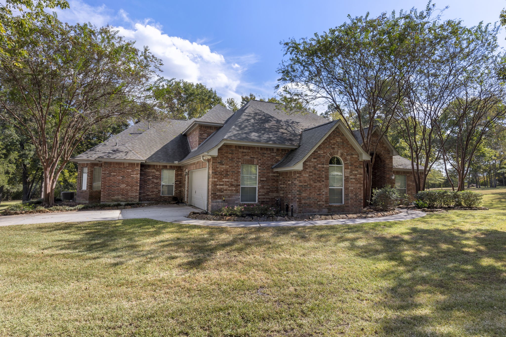 20111 Hilltop Ranch Drive Montgomery, TX 77316 - Photo 31 of 32 a view of a house with a yard