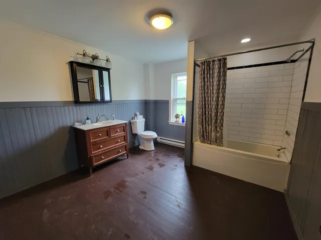 a room with furniture and a window