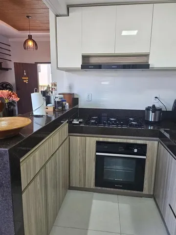 a room with furniture and a large window