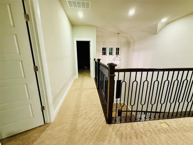 a view of entryway with livingroom