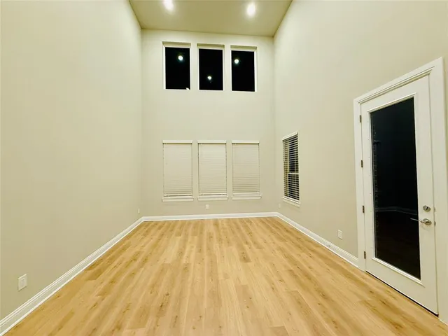 a view of a big room with wooden floor