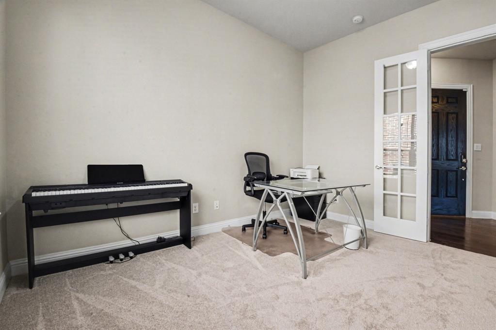 3323 Royal Ridge Drive Rockwall, TX 75087 - Photo 12 of 37 a view of a workspace with furniture