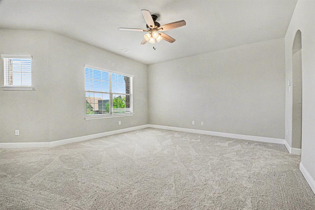 3323 Royal Ridge Drive Rockwall, TX 75087 - Photo 23 of 37 a view of an empty room with a window