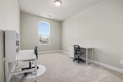 a room with furniture and a window