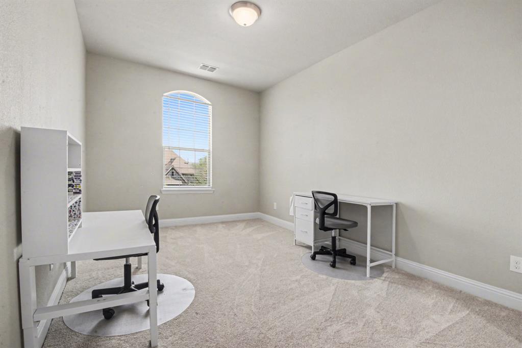 3323 Royal Ridge Drive Rockwall, TX 75087 - Photo 25 of 37 a room with furniture and a window