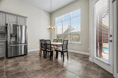 a dining room well furnished