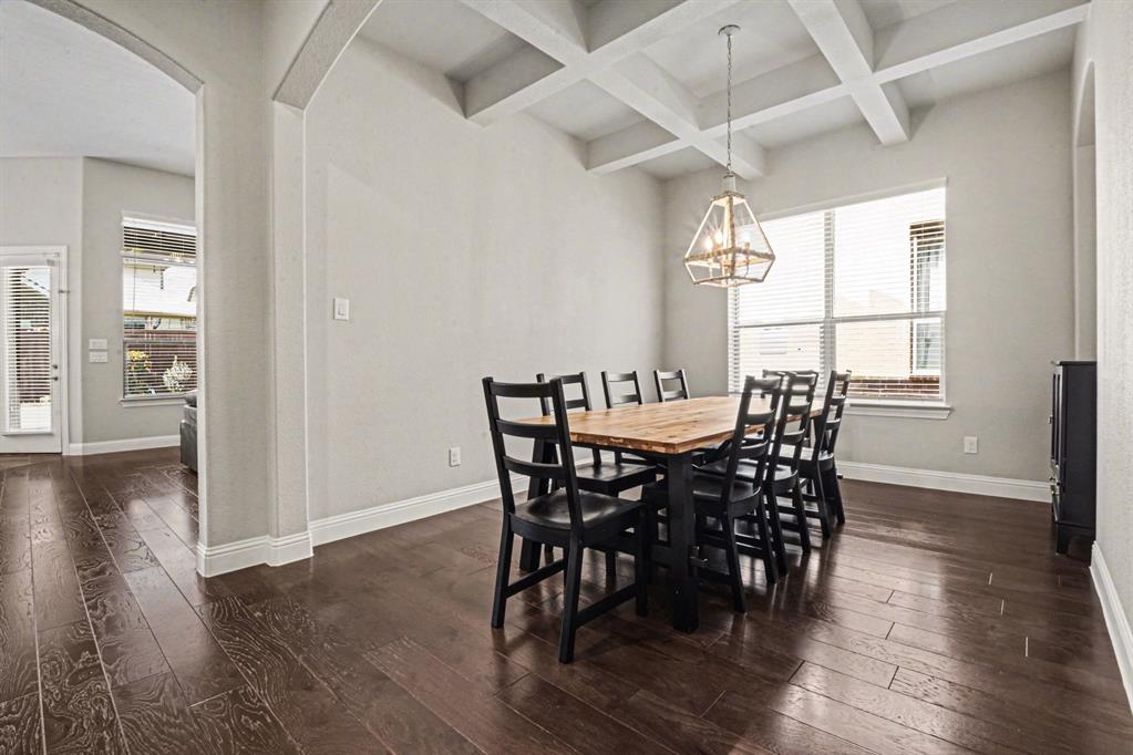 3323 Royal Ridge Drive Rockwall, TX 75087 - Photo 9 of 37 a view of a dining room with furniture window and wooden floor
