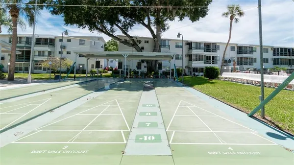 a view of building with yard
