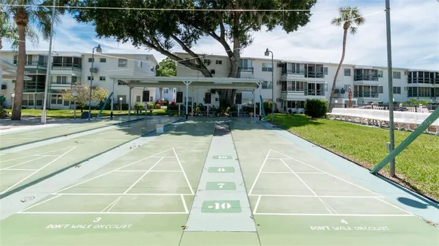 a view of building with yard