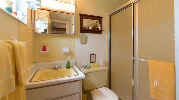 a bathroom with a sink and a toilet