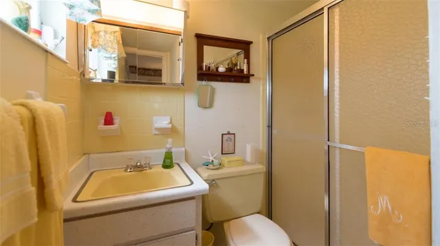 a bathroom with a sink and a toilet