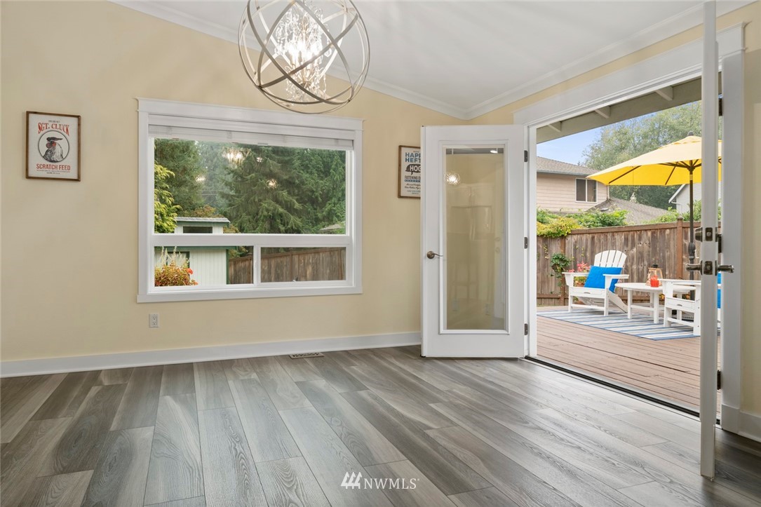 23513 22nd Avenue Southeast Bothell, WA 98021 - Photo 25 of 33 a view of livingroom with furniture wooden floor and window