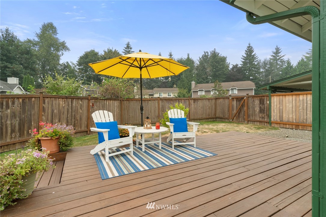 23513 22nd Avenue Southeast Bothell, WA 98021 - Photo 28 of 33 a view of a deck with furniture