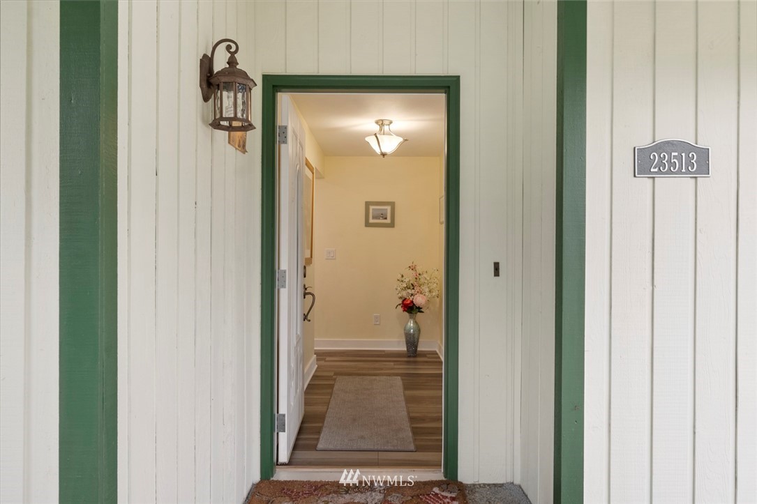 23513 22nd Avenue Southeast Bothell, WA 98021 - Photo 5 of 33 a view of a hallway with wooden floor and closet