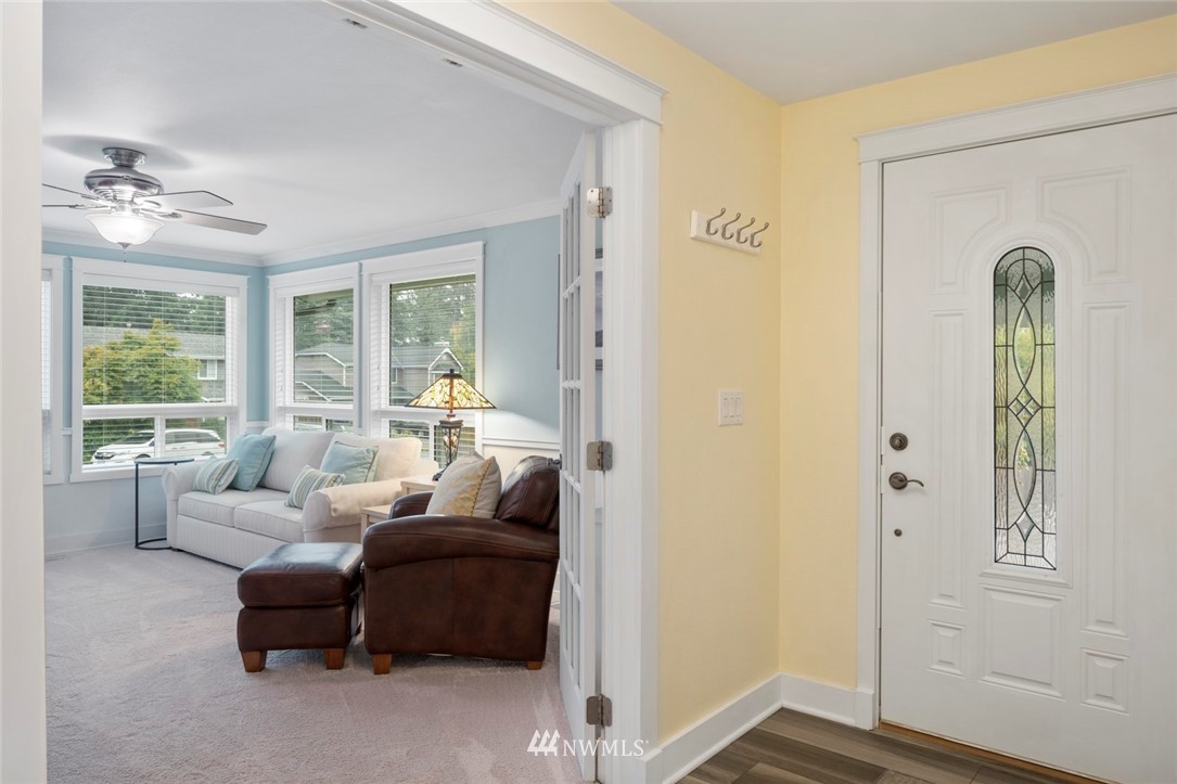 23513 22nd Avenue Southeast Bothell, WA 98021 - Photo 10 of 33 a living room with furniture and a window