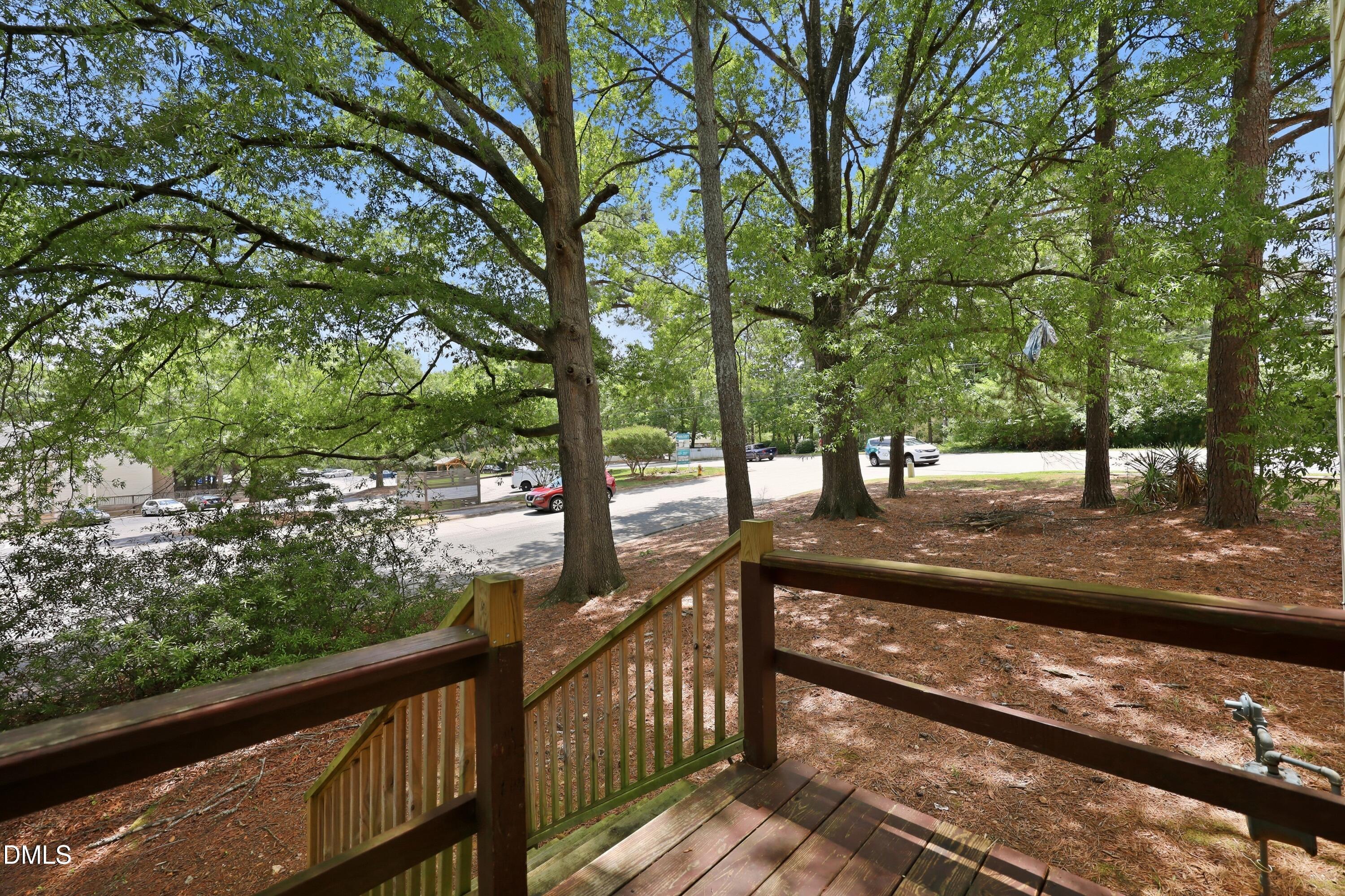 669 Bashford Road Raleigh, NC 27606 - Photo 17 of 19 a view of a street with a tree