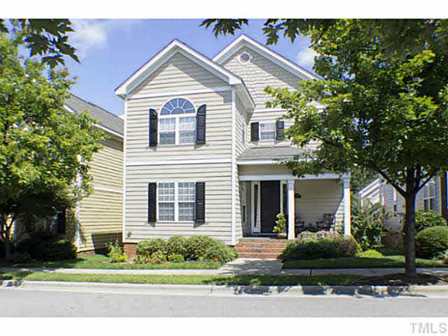 1172 Harp Street Raleigh, NC 27604 - Photo 1 of 25 a front view of a house with a yard