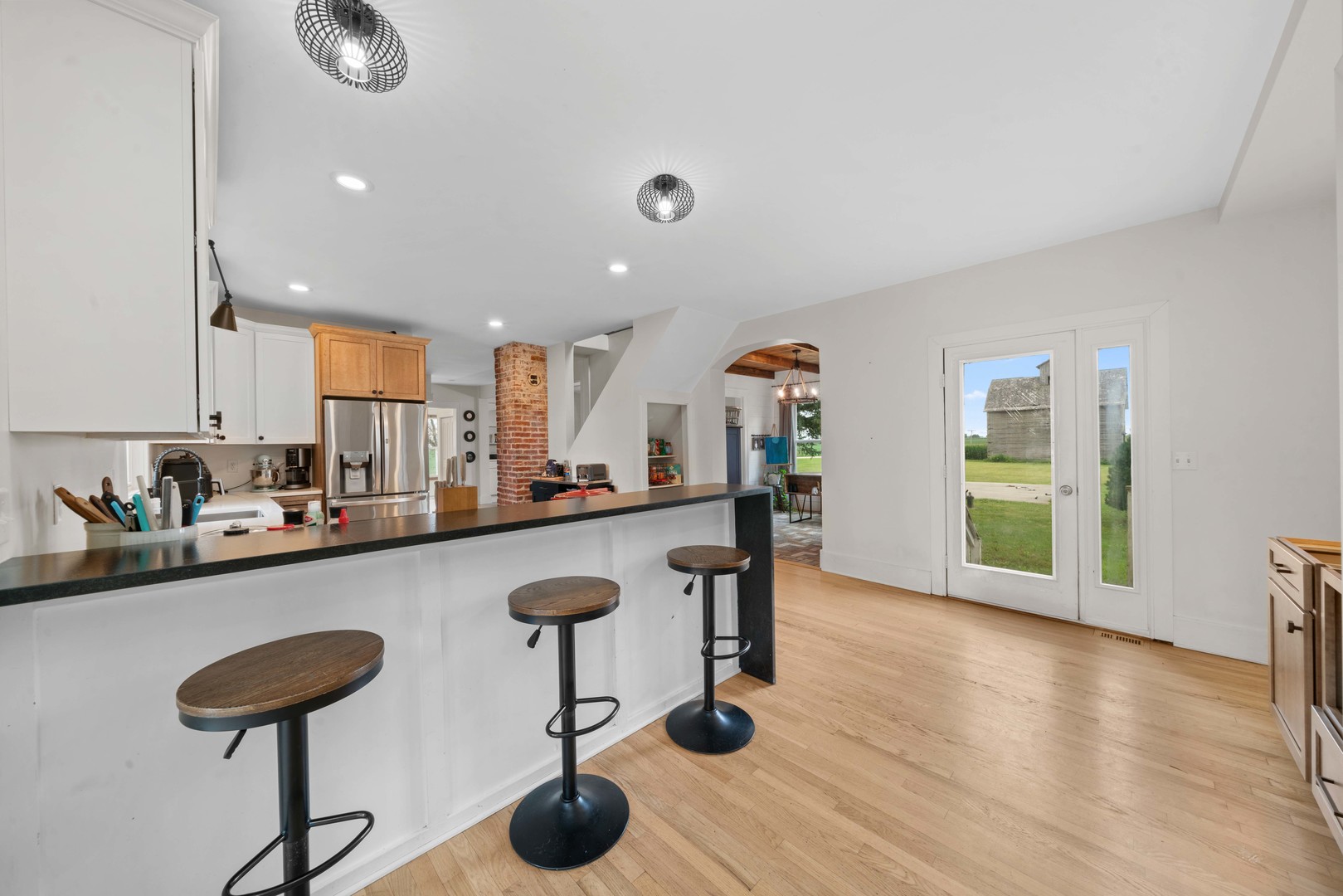 3705 Elva Road Malta, IL 60150 - Photo 12 of 42 a room with lots of counter space and furniture