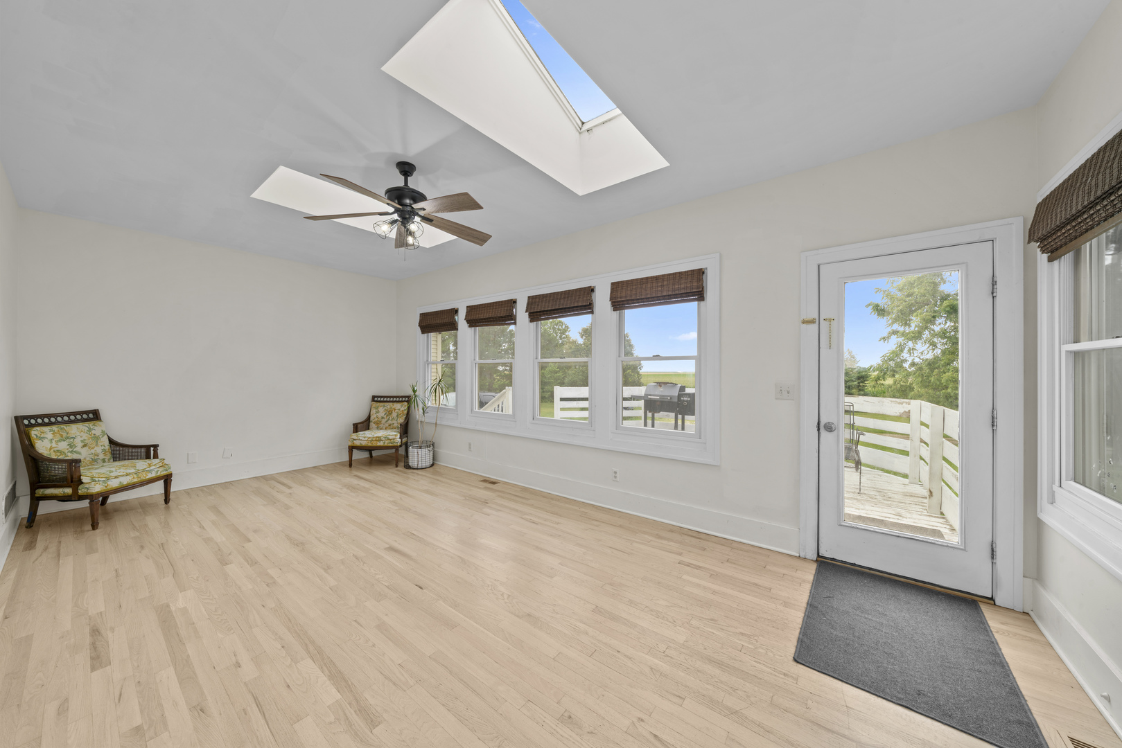 3705 Elva Road Malta, IL 60150 - Photo 21 of 42 wooden floor in an empty room with a window
