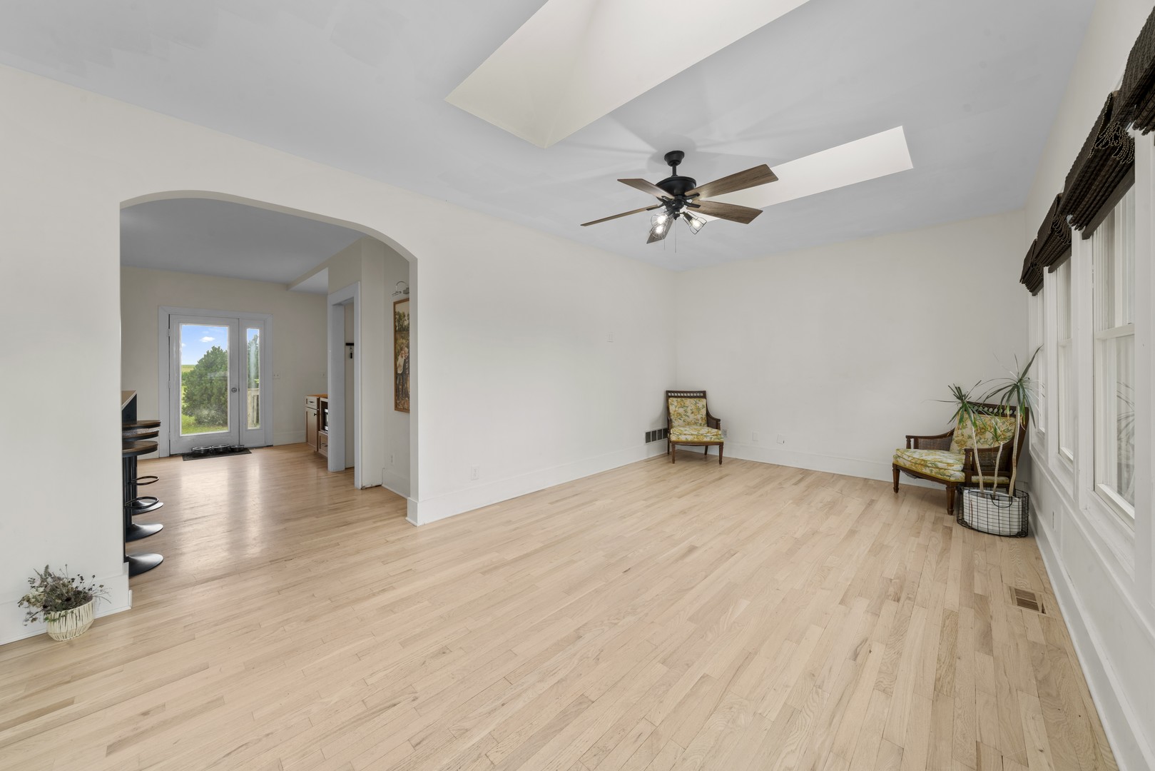 3705 Elva Road Malta, IL 60150 - Photo 22 of 42 wooden floor in an empty room with a window