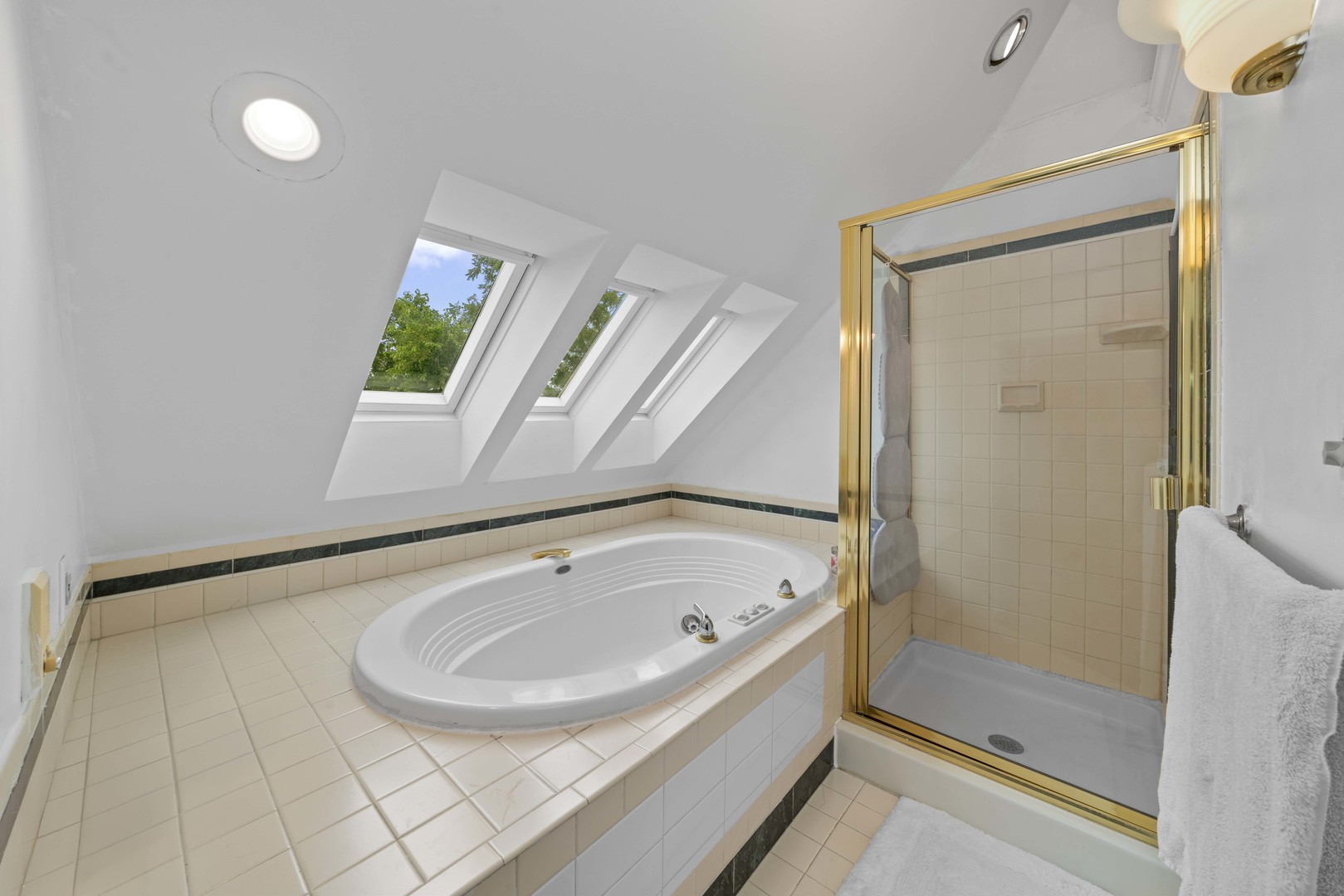 3705 Elva Road Malta, IL 60150 - Photo 25 of 42 a bathroom with a tub and shower