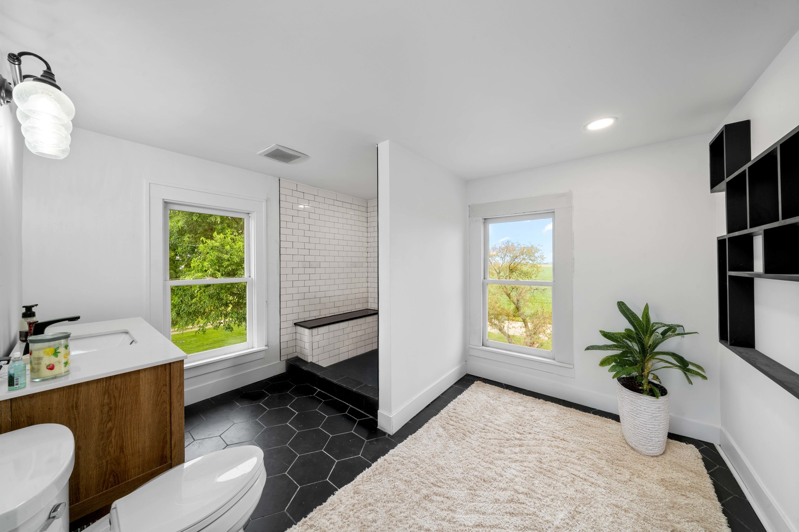 3705 Elva Road Malta, IL 60150 - Photo 28 of 42 a bathroom with a sink toilet and tub