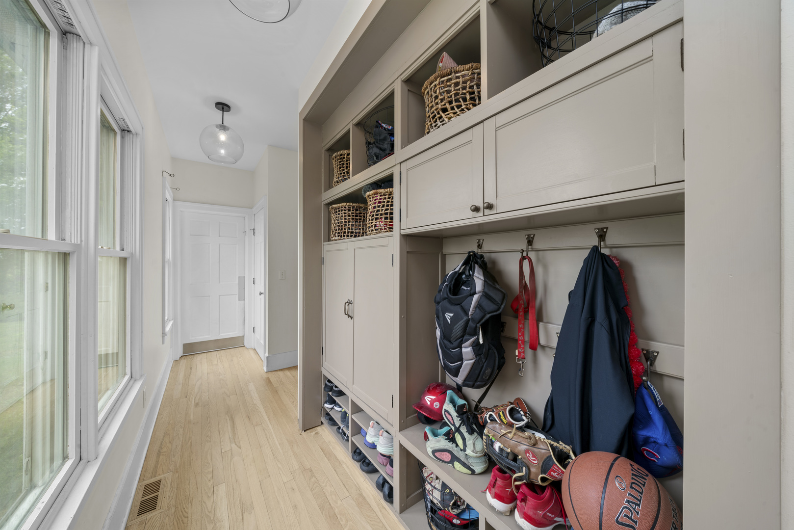 3705 Elva Road Malta, IL 60150 - Photo 29 of 42 a view of walk in closet with clothes and shoes