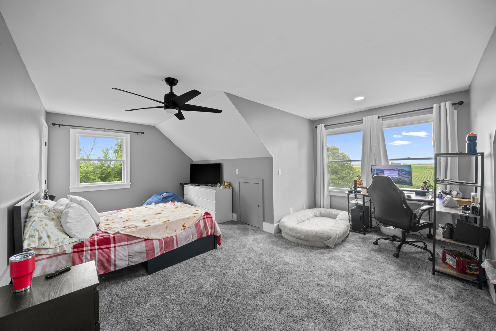 3705 Elva Road Malta, IL 60150 - Photo 33 of 42 a bedroom with bed and window