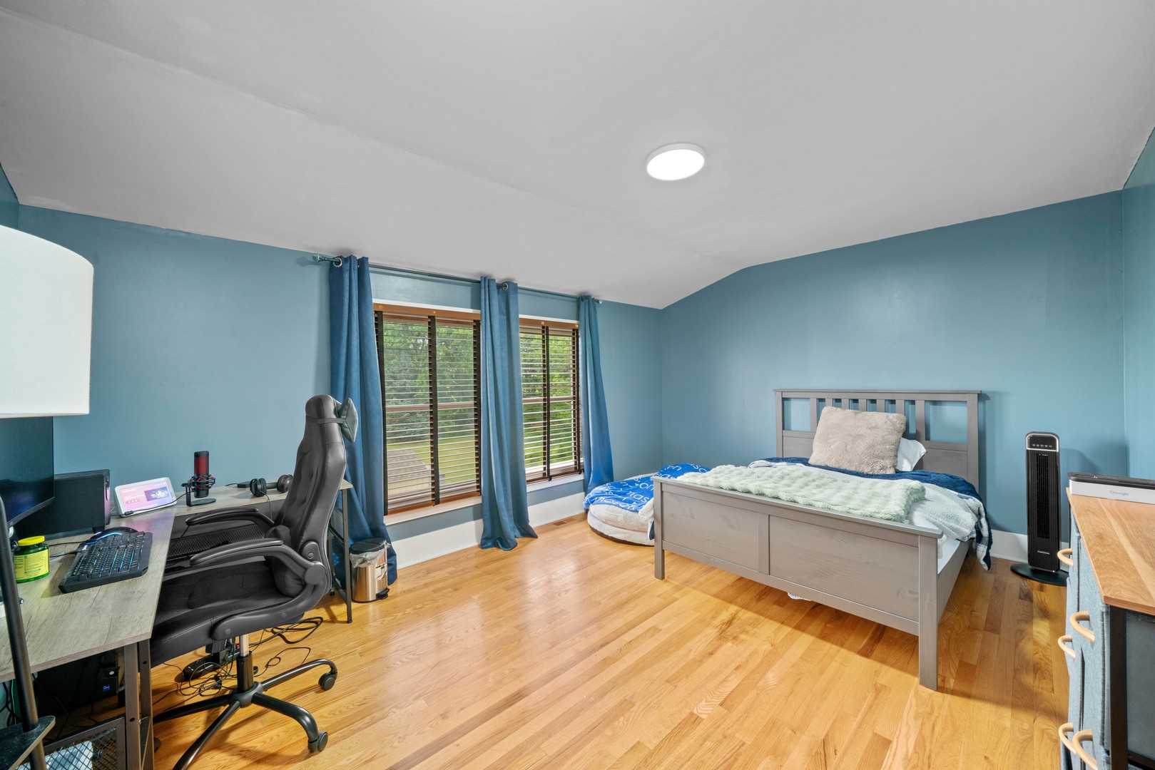 3705 Elva Road Malta, IL 60150 - Photo 35 of 42 a bedroom with a bed and wooden floor