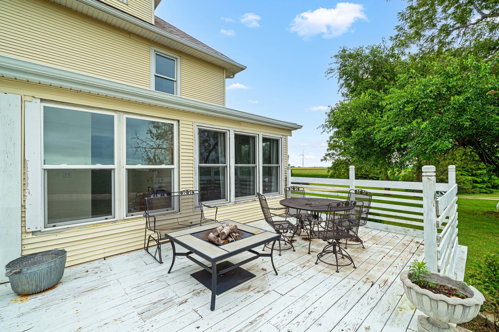3705 Elva Road Malta, IL 60150 - Photo 40 of 42 a view of a lounge chairs on the deck